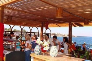 Breakfast, lunch, dinner served; beach views  - Neptune Hotel (Dahab)