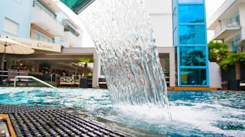 Outdoor pool, pool umbrellas, sun loungers