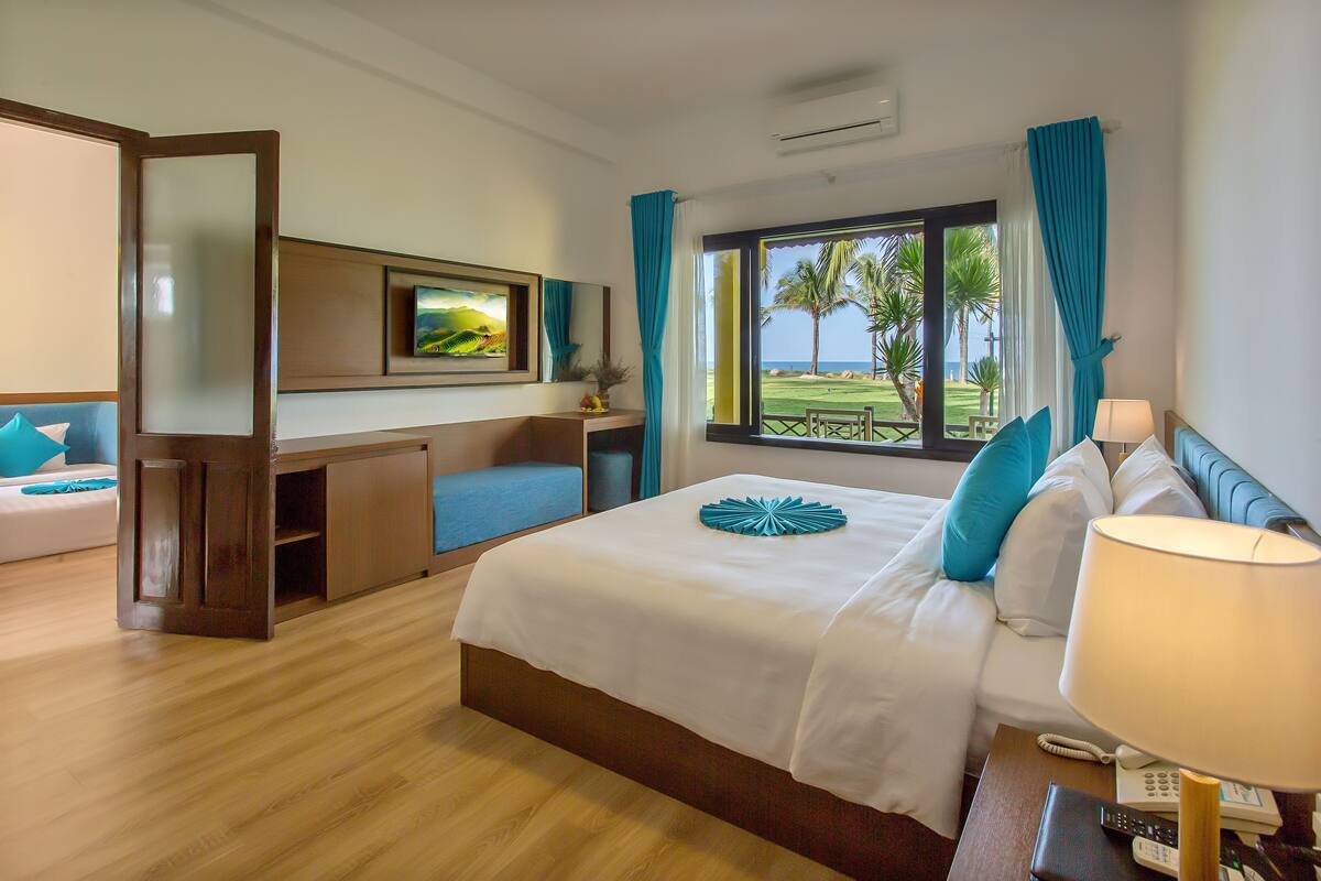 Family Room, 2 Bedrooms | Minibar, in-room safe, desk, blackout drapes