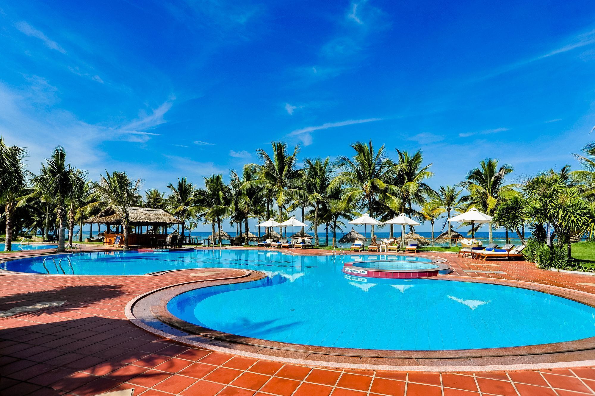 Outdoor pool, pool umbrellas, pool loungers