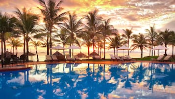 Outdoor pool, pool umbrellas, sun loungers