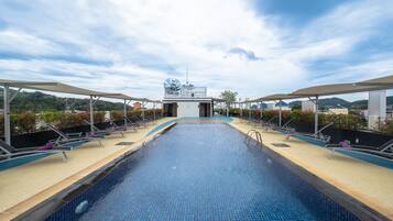 Outdoor pool, sun loungers