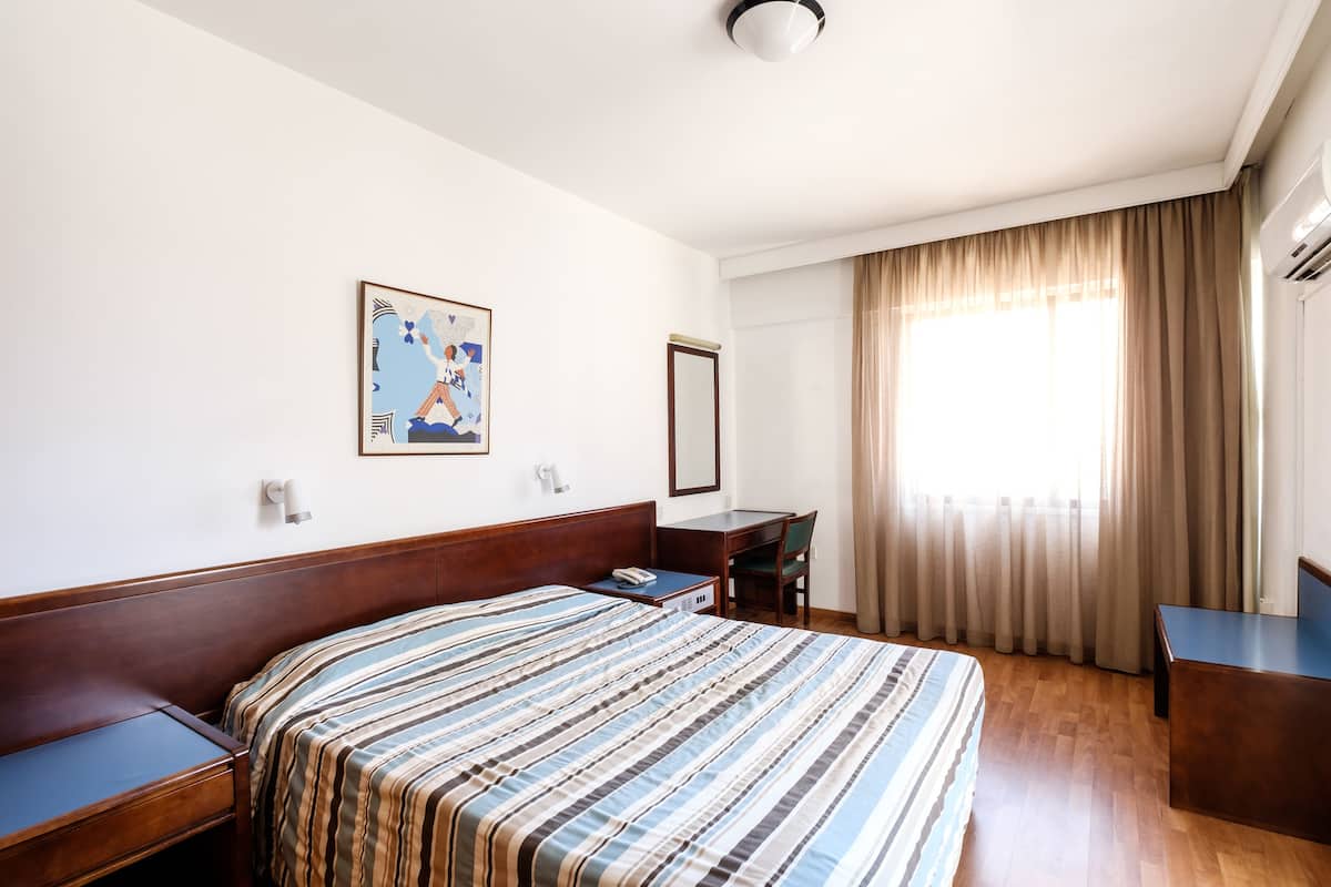 Luxe beddengoed, een kluis op de kamer, verduisterende gordijnen