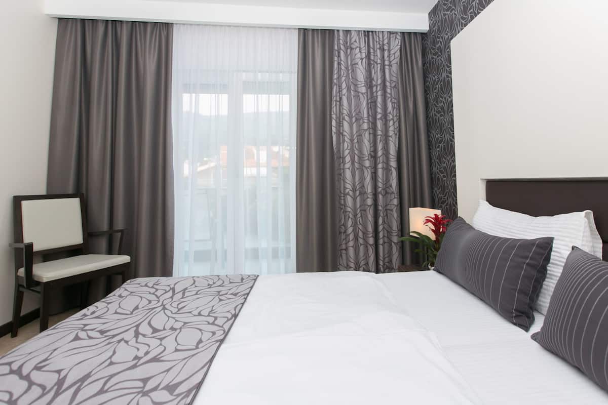 classic double room, balcony, park view | premium bedding, minibar, in-room safe, desk