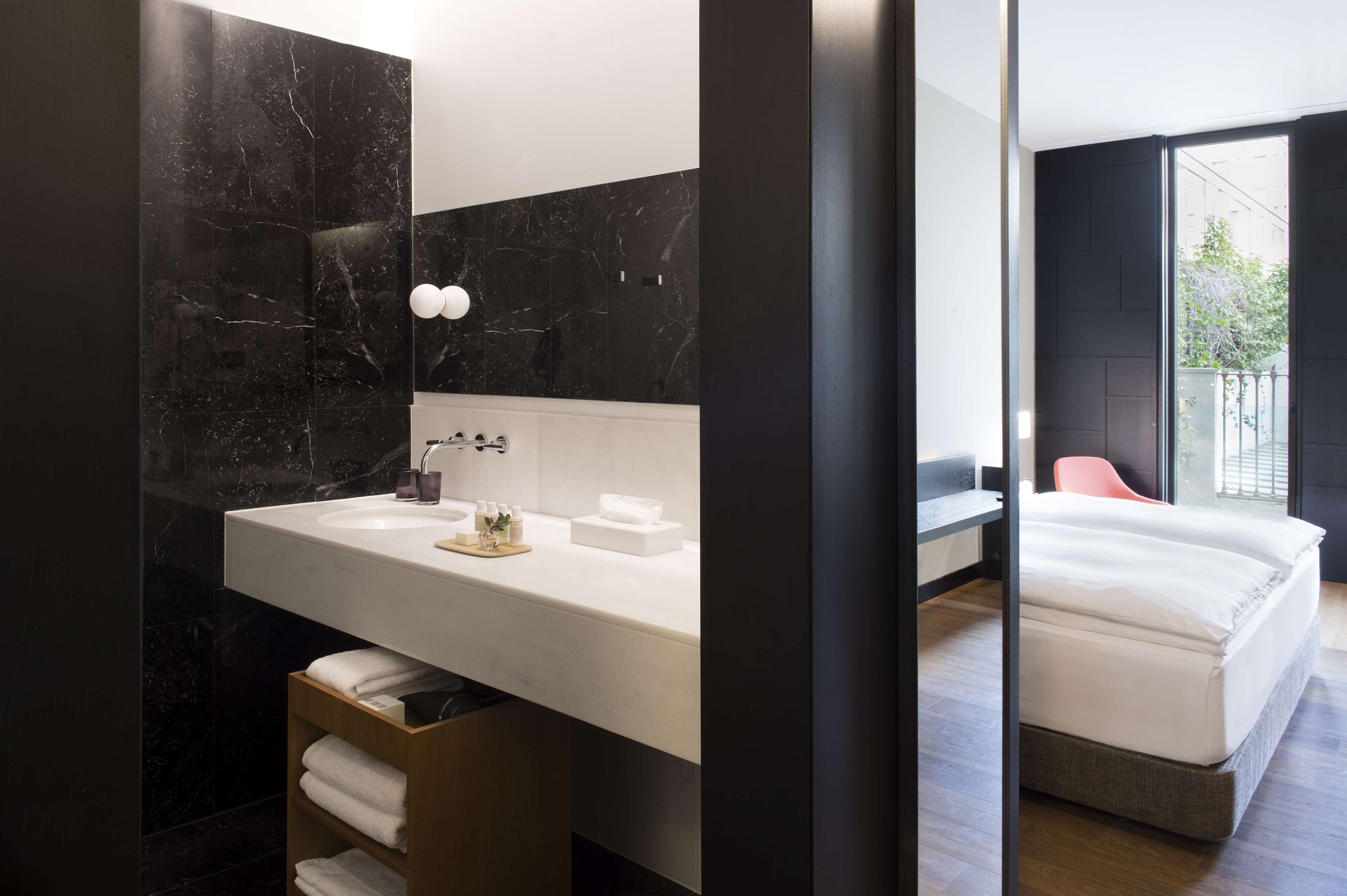standard double room | bathroom | designer toiletries, hair dryer, bathrobes, slippers