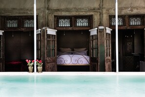 Bath House | Premium bedding, minibar, in-room safe, individually decorated