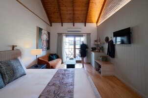 Habitación Premium | Ropa de cama de alta calidad y colchones con acolchado adicional