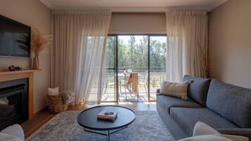 Premier Suite | Living area | 0-inch LCD TV with digital channels, TV