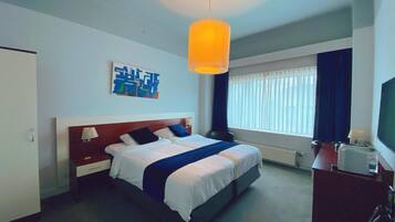 Pillowtop-bedden, een minibar, een kluis op de kamer, een bureau