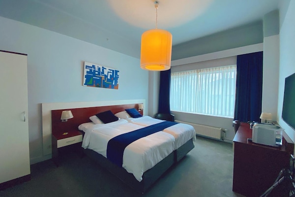 Pillowtop beds, minibar, in-room safe, desk