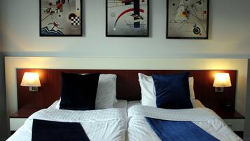 Pillow-top beds, minibar, in-room safe, desk