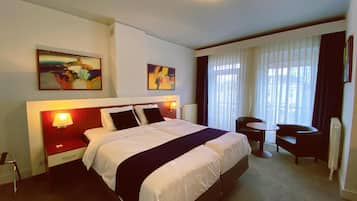 Camas com colchões pillow-top, frigobar, cofres nos quartos