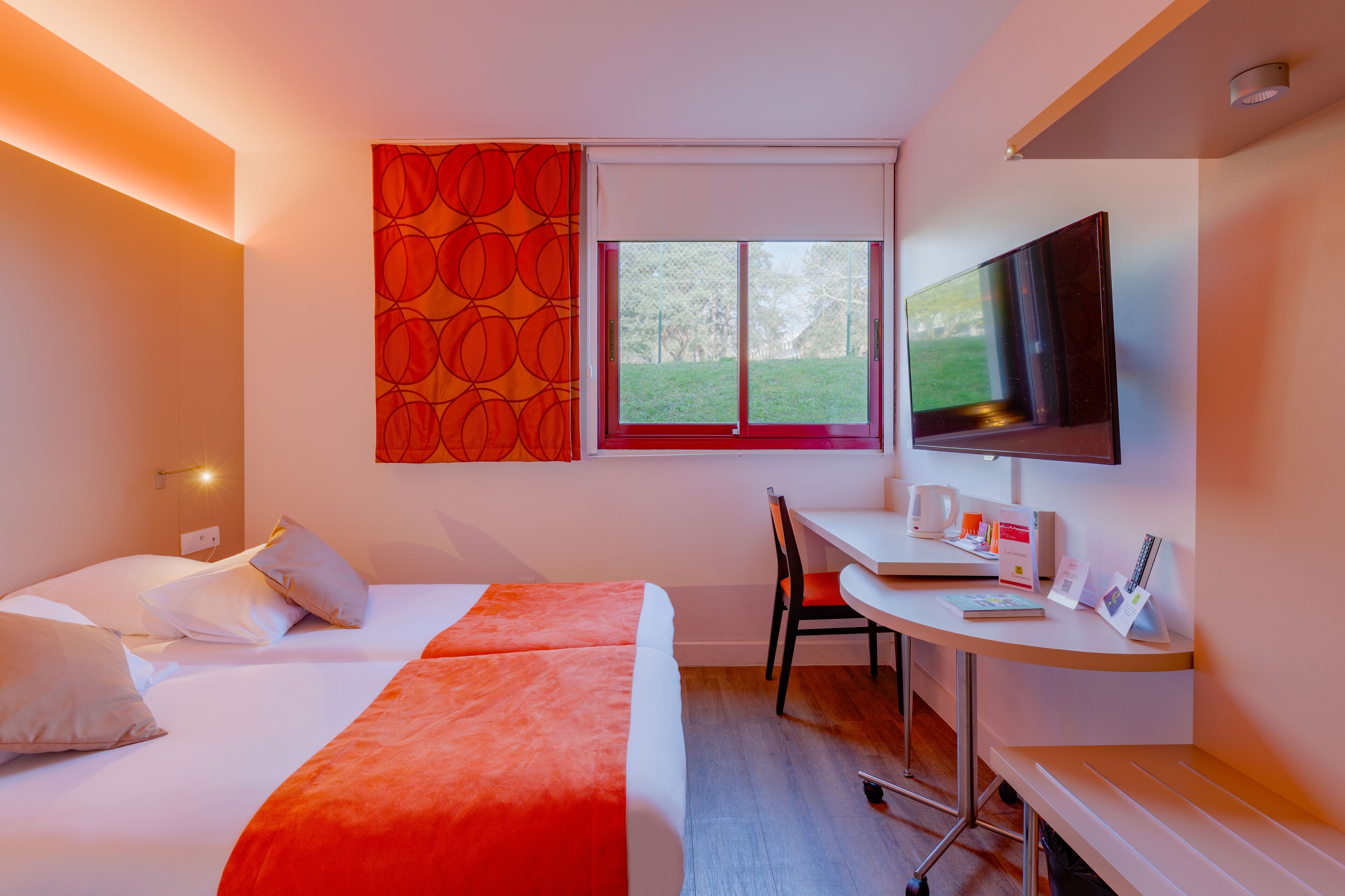 standard twin room | premium bedding, desk, laptop workspace, blackout curtains