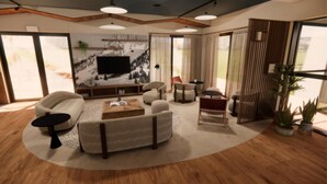 A modern living room with a sofa, armchairs, a coffee table, and a TV. - Kyriad - L'Isle-D'Abeau Bourgoin-Jallieu (L'Isle-d'Abeau)
