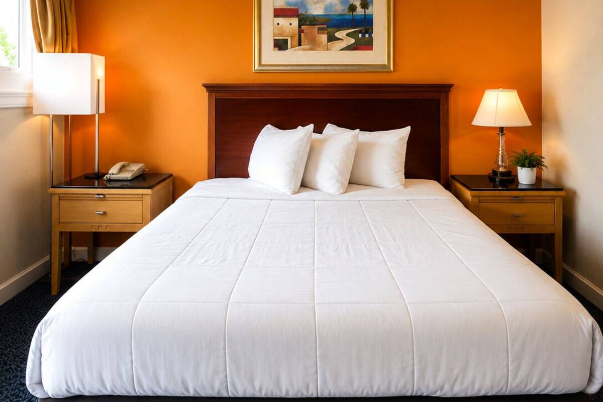 Premium bedding, pillowtop beds, desk, laptop workspace