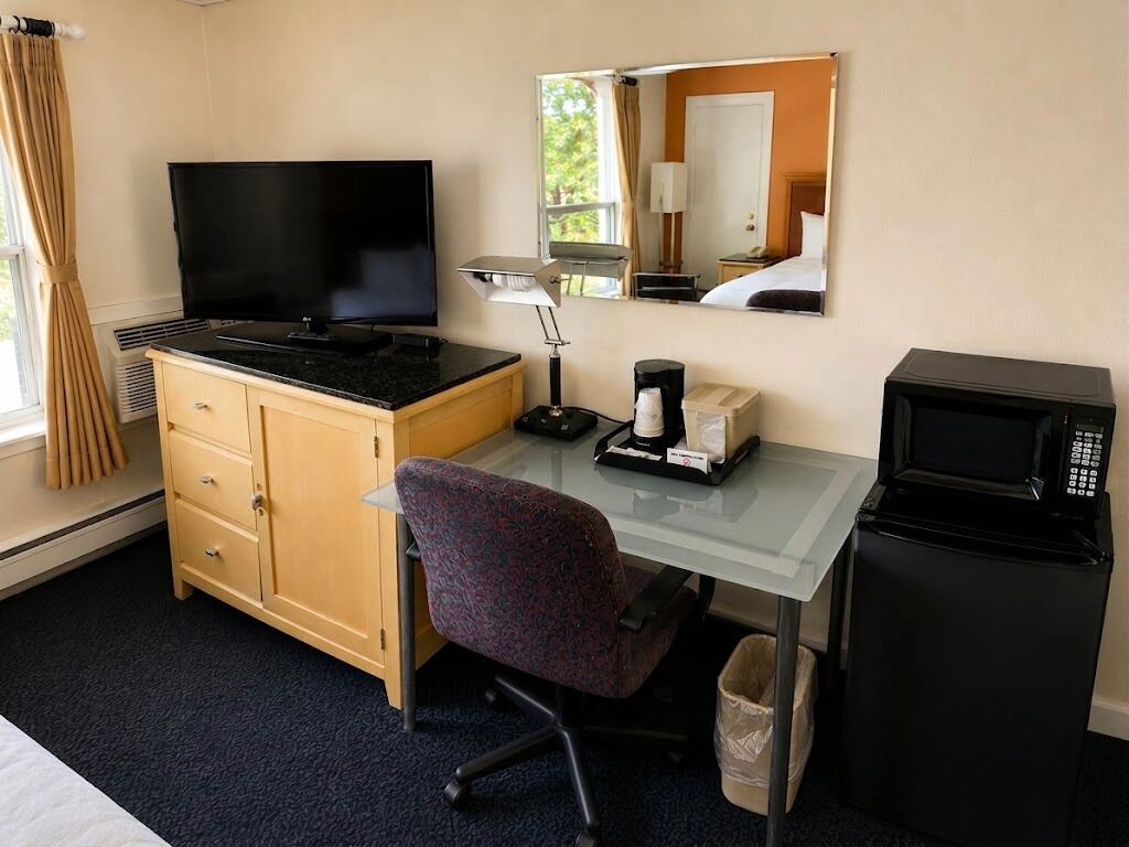 Premium bedding, pillowtop beds, desk, laptop workspace