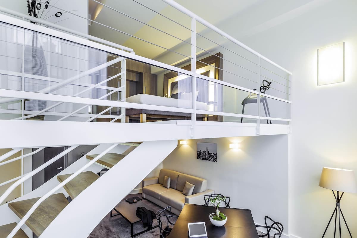 Suite, 1 Double Bed (Duplex) | Minibar, in-room safe, desk, soundproofing
