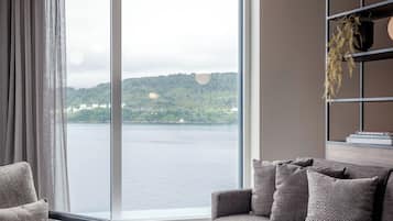 Chambre Deluxe, 1 lit double, non-fumeur | Vue sur la plage ou l’océan