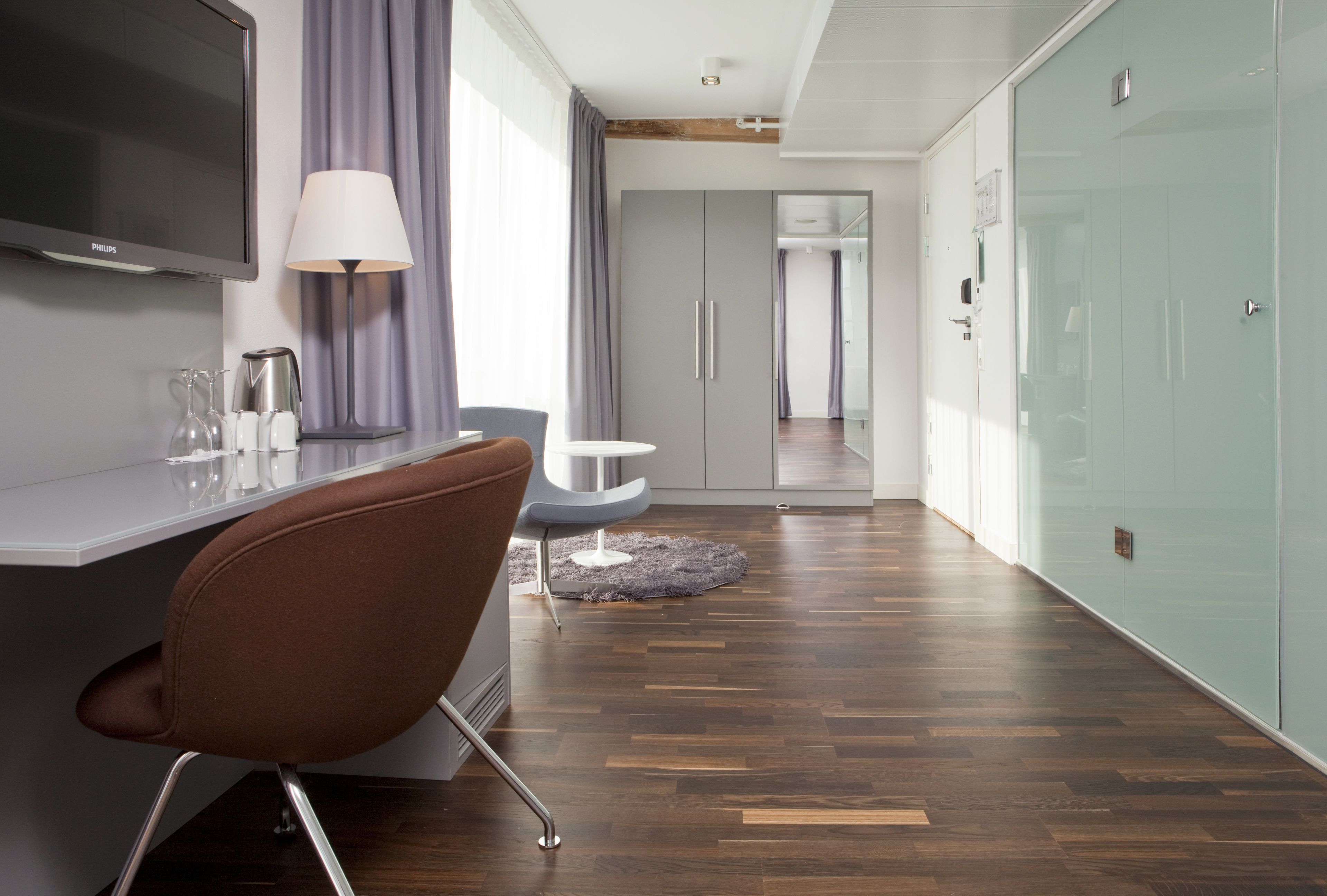 junior suite | in-room safe, blackout curtains, iron/ironing board, cots/infant beds