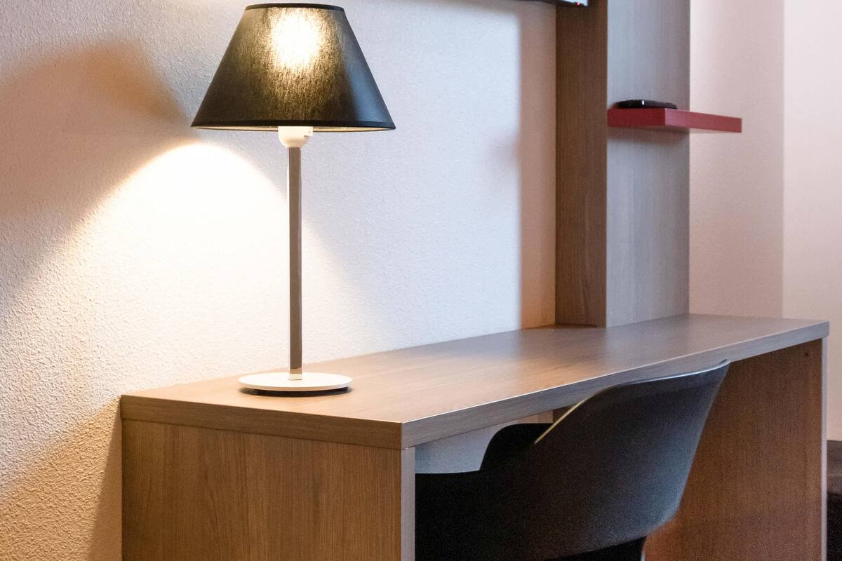 Desk, blackout drapes, soundproofing, iron/ironing board