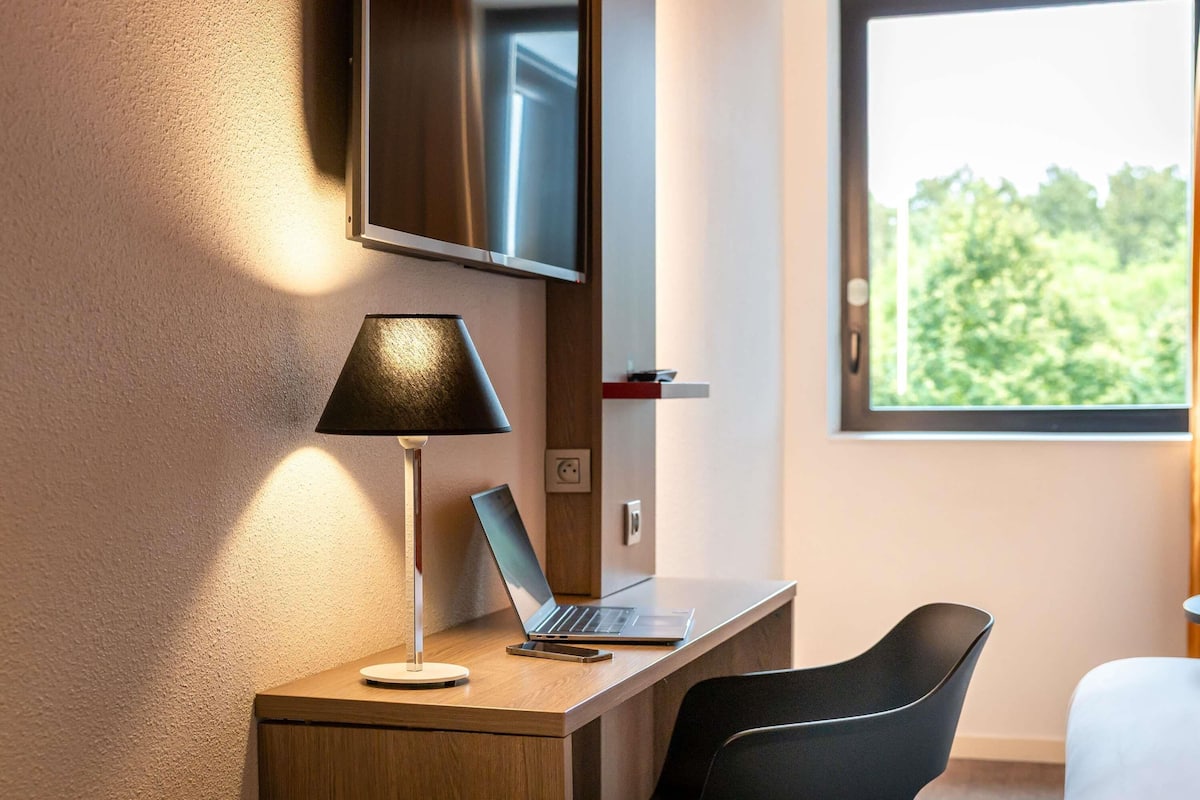 Desk, blackout curtains, soundproofing, iron/ironing board
