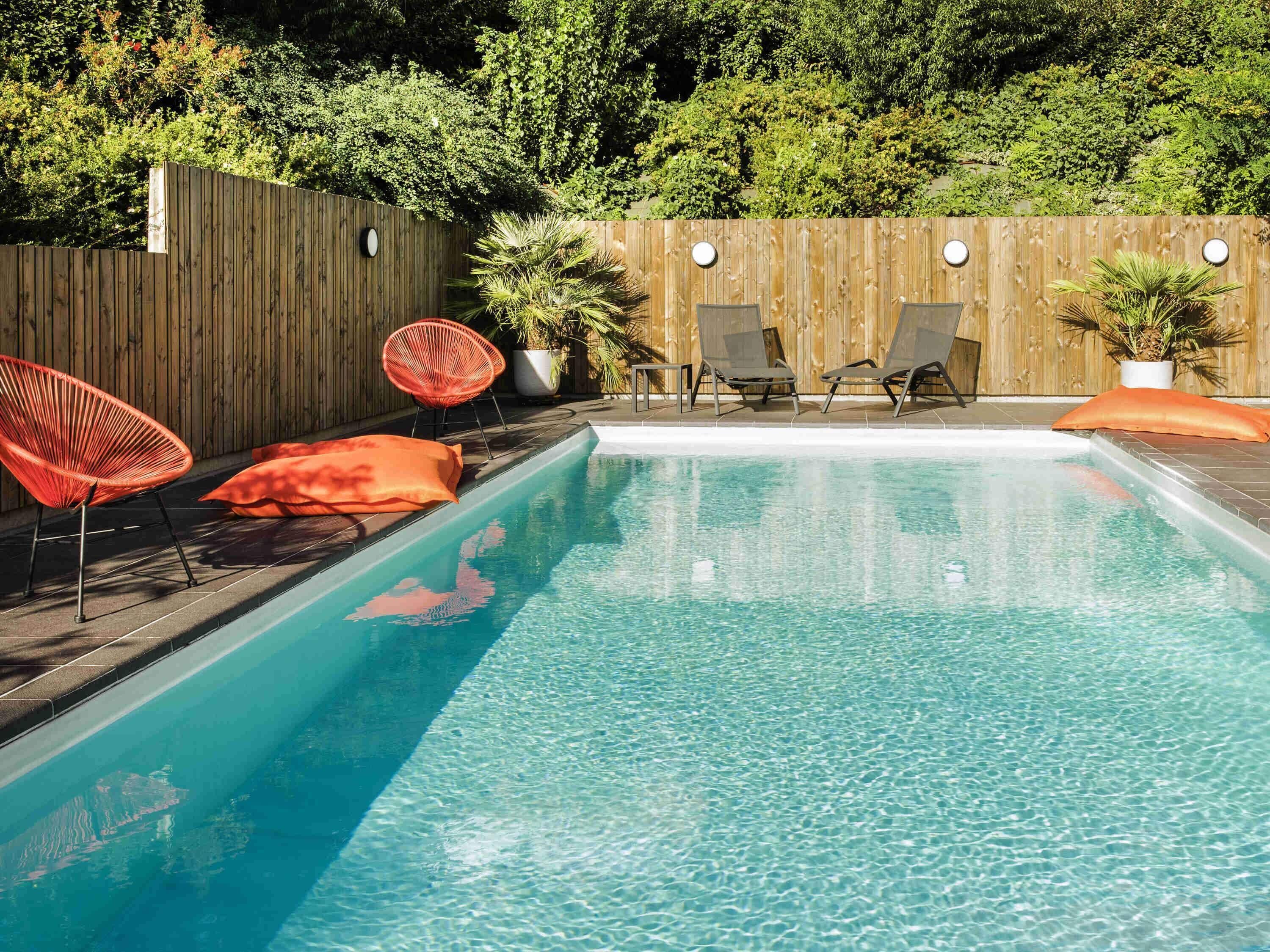 Seasonal outdoor pool, open 8:00 AM to 10:00 PM, sun loungers