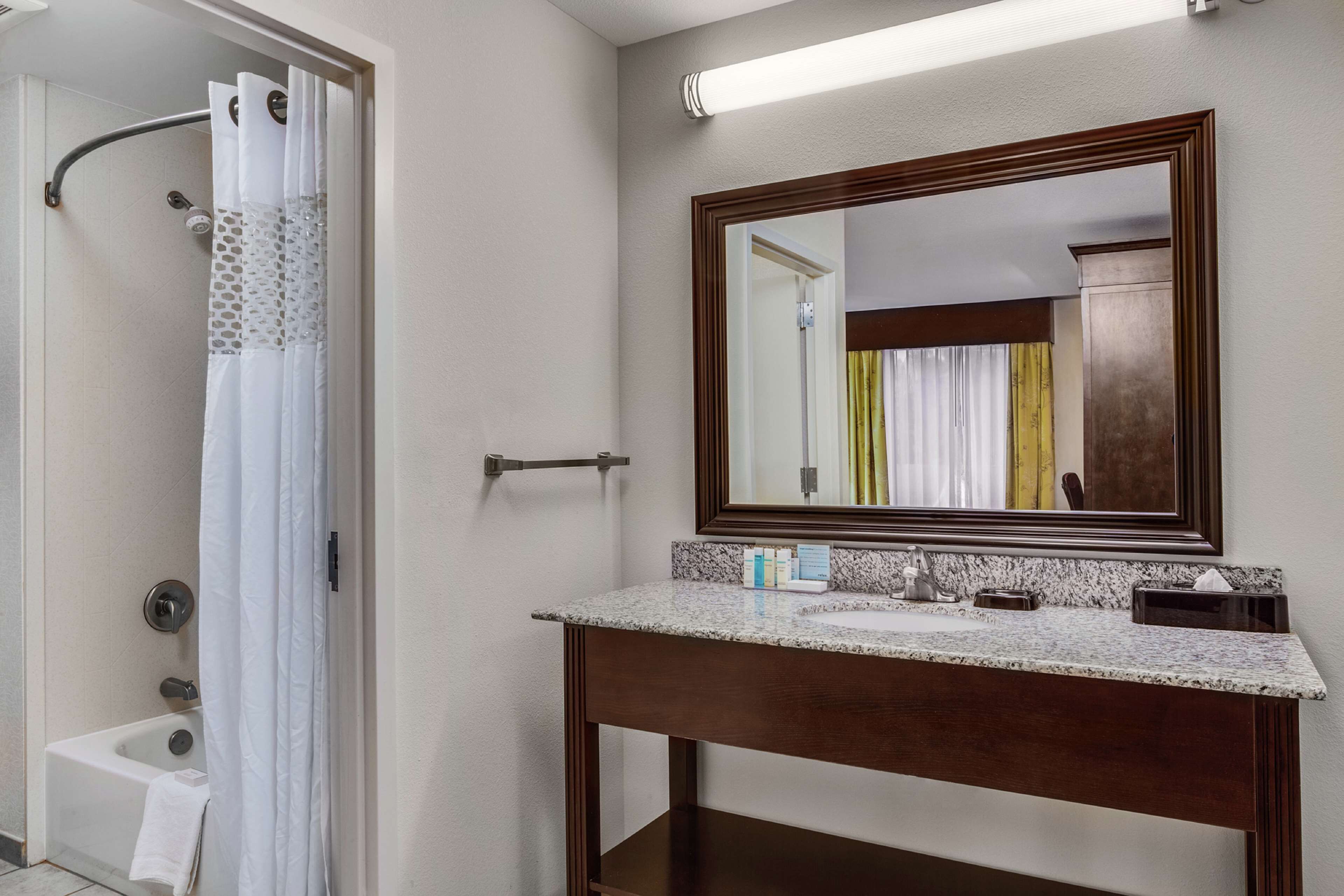 studio, 2 queen beds, refrigerator & microwave (wet bar) | bathroom shower