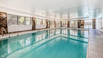 Outdoor pool, open 9:00 AM to 9:00 PM, pool umbrellas, pool loungers