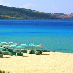 Private beach, black sand, sun-loungers, beach umbrellas