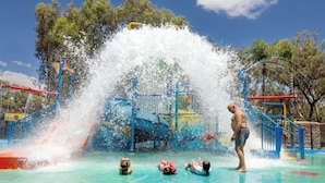 A water park with a large water slide and a pool area. - Discovery Parks - Renmark Riverfront (Renmark)