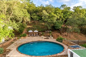 2 outdoor pools, pool umbrellas, pool loungers