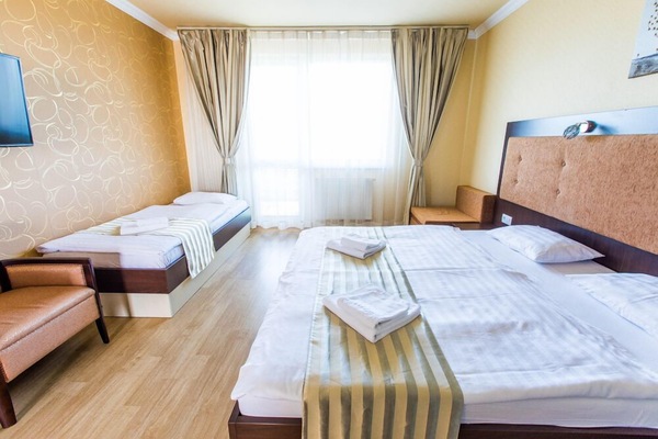 Standard Triple Room | Minibar, in-room safe, desk, laptop workspace