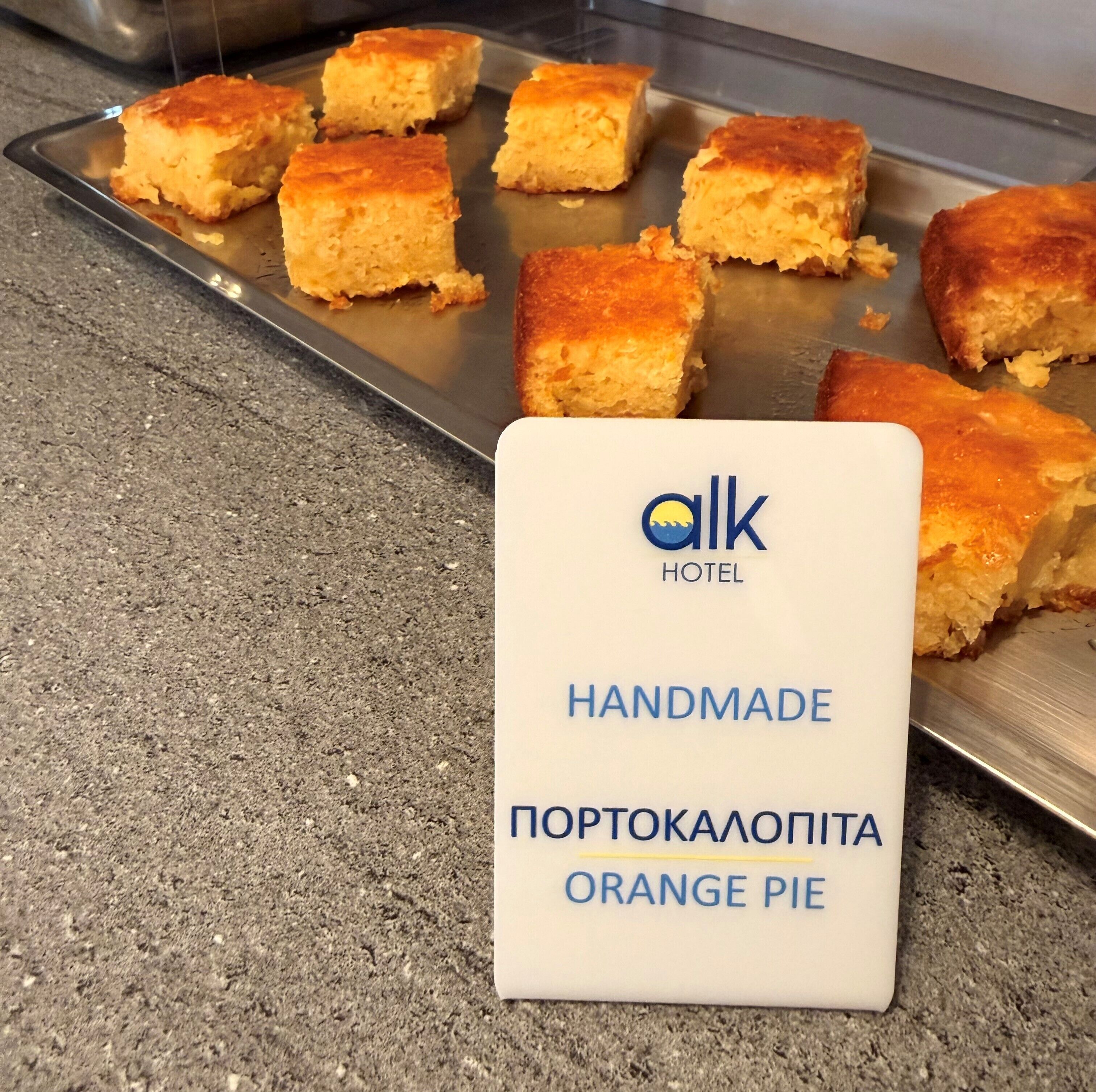 A tray of orange pie slices on a countertop.