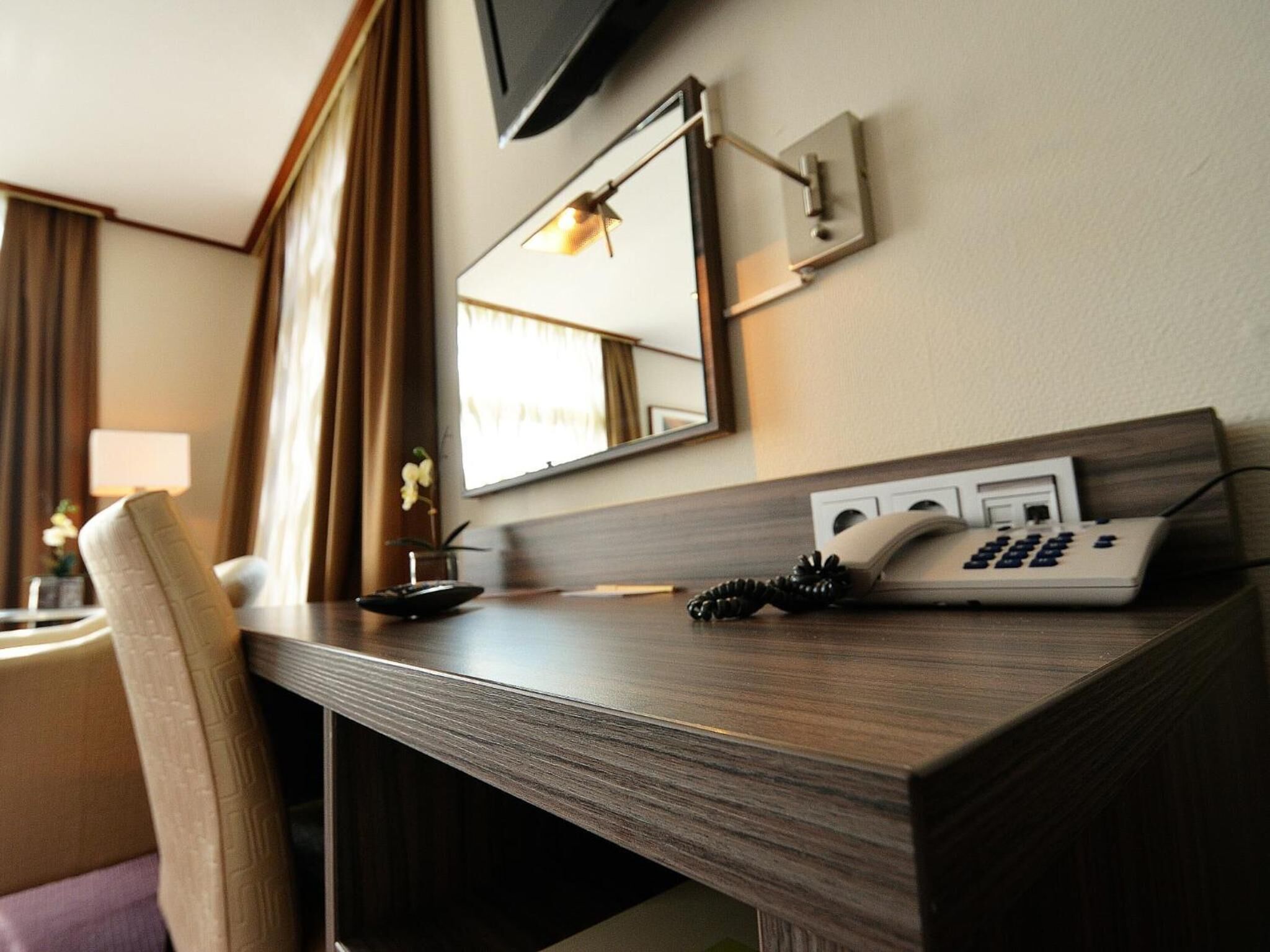 desk, blackout curtains, iron/ironing board, cots/infant beds