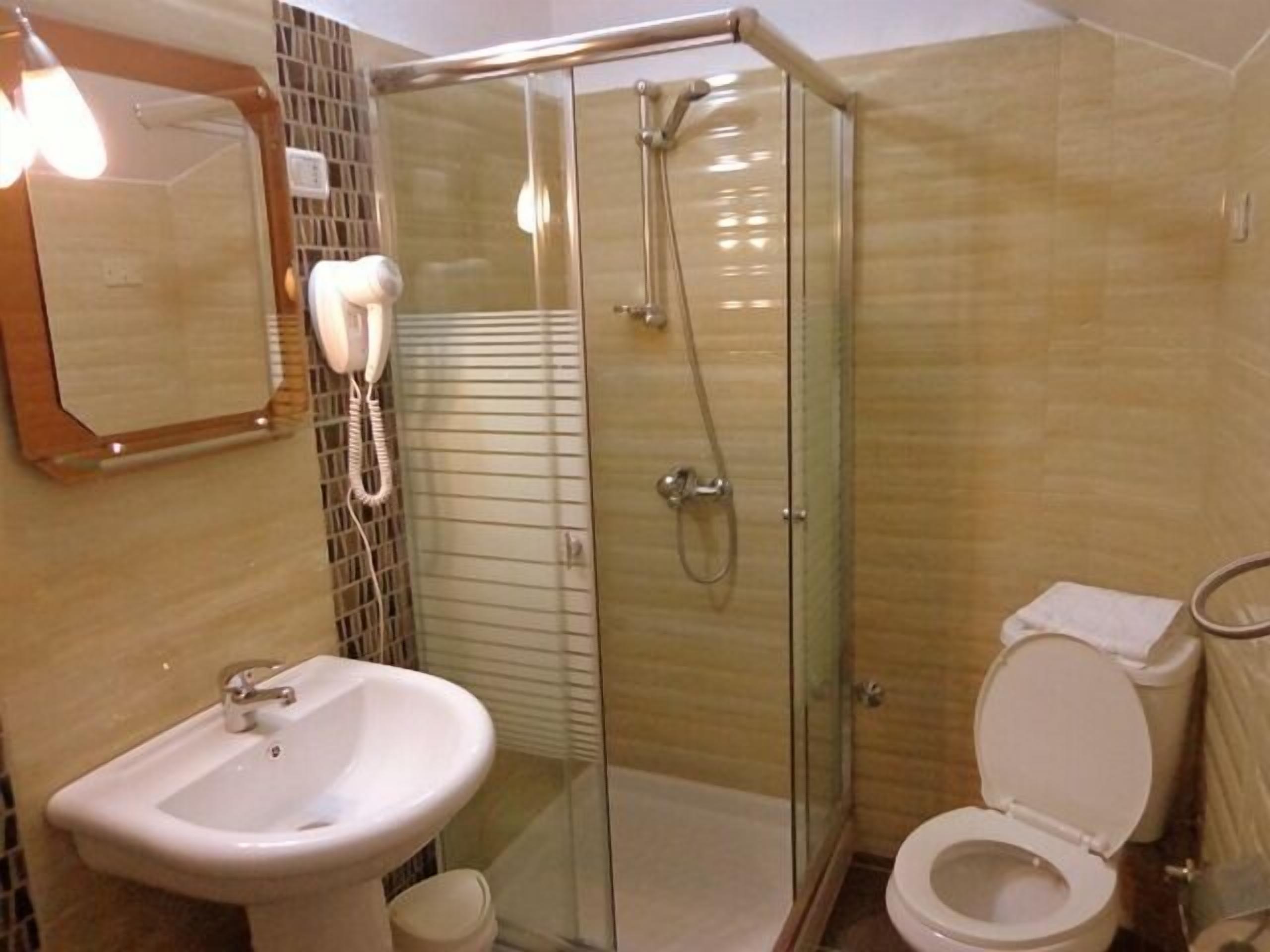 shower, free toiletries, hair dryer, slippers