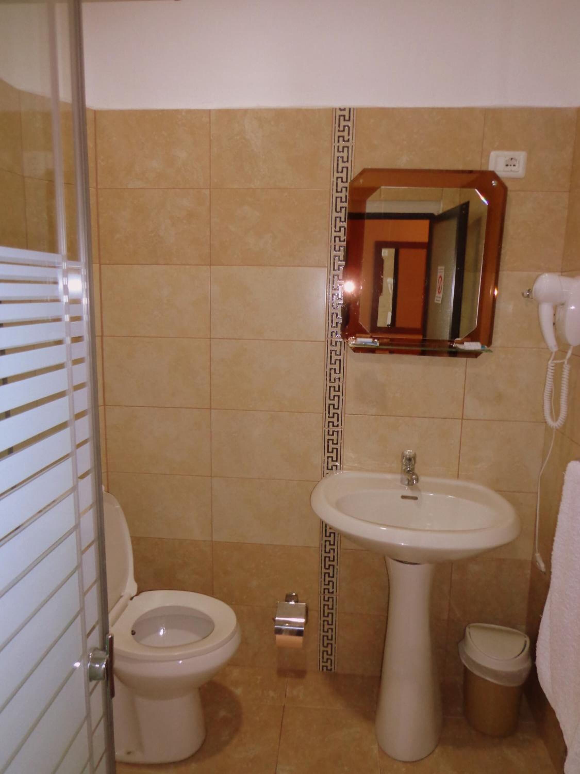 shower, free toiletries, hair dryer, slippers