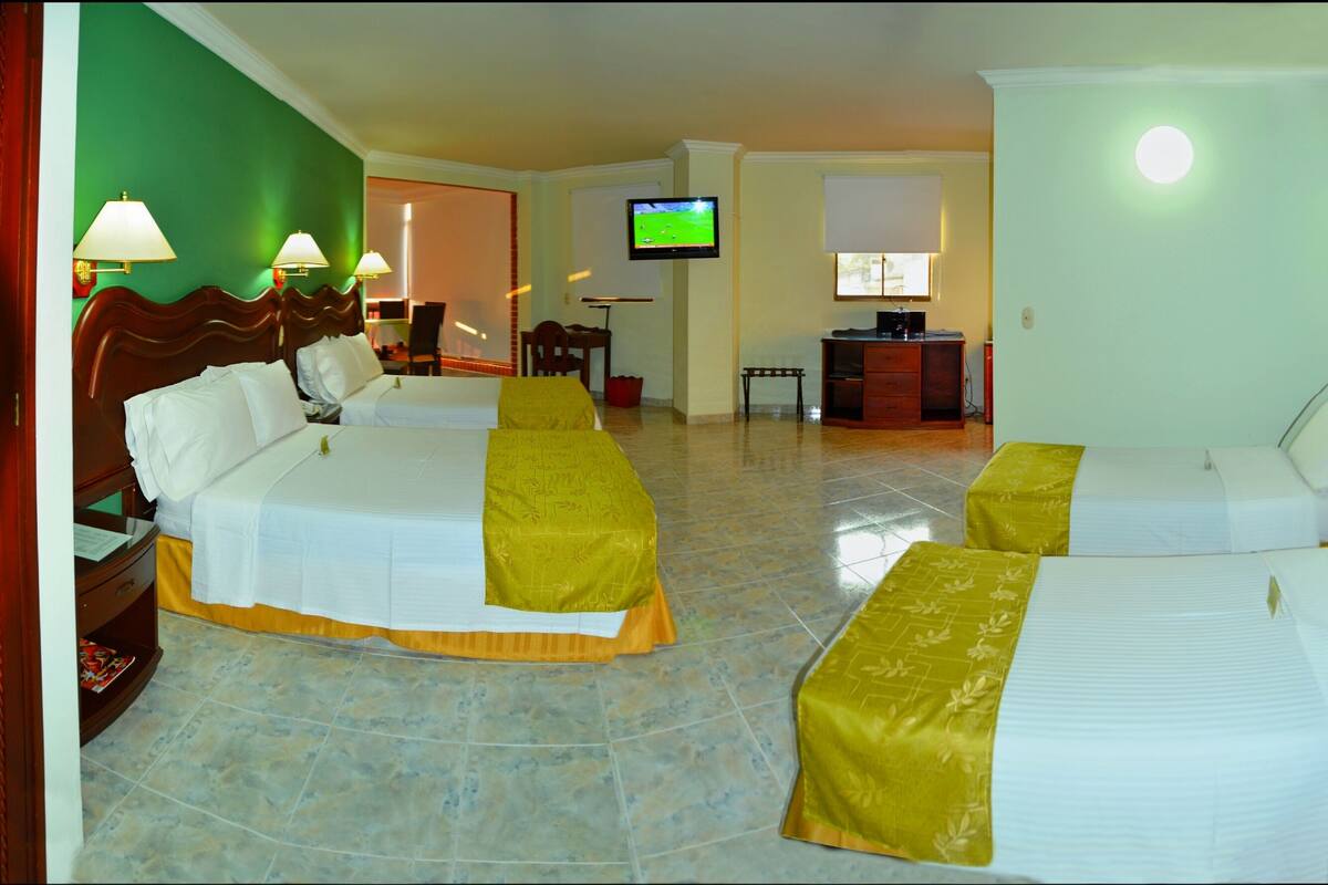 Quadruple Room | Minibar, in-room safe, desk, free cots/infant beds