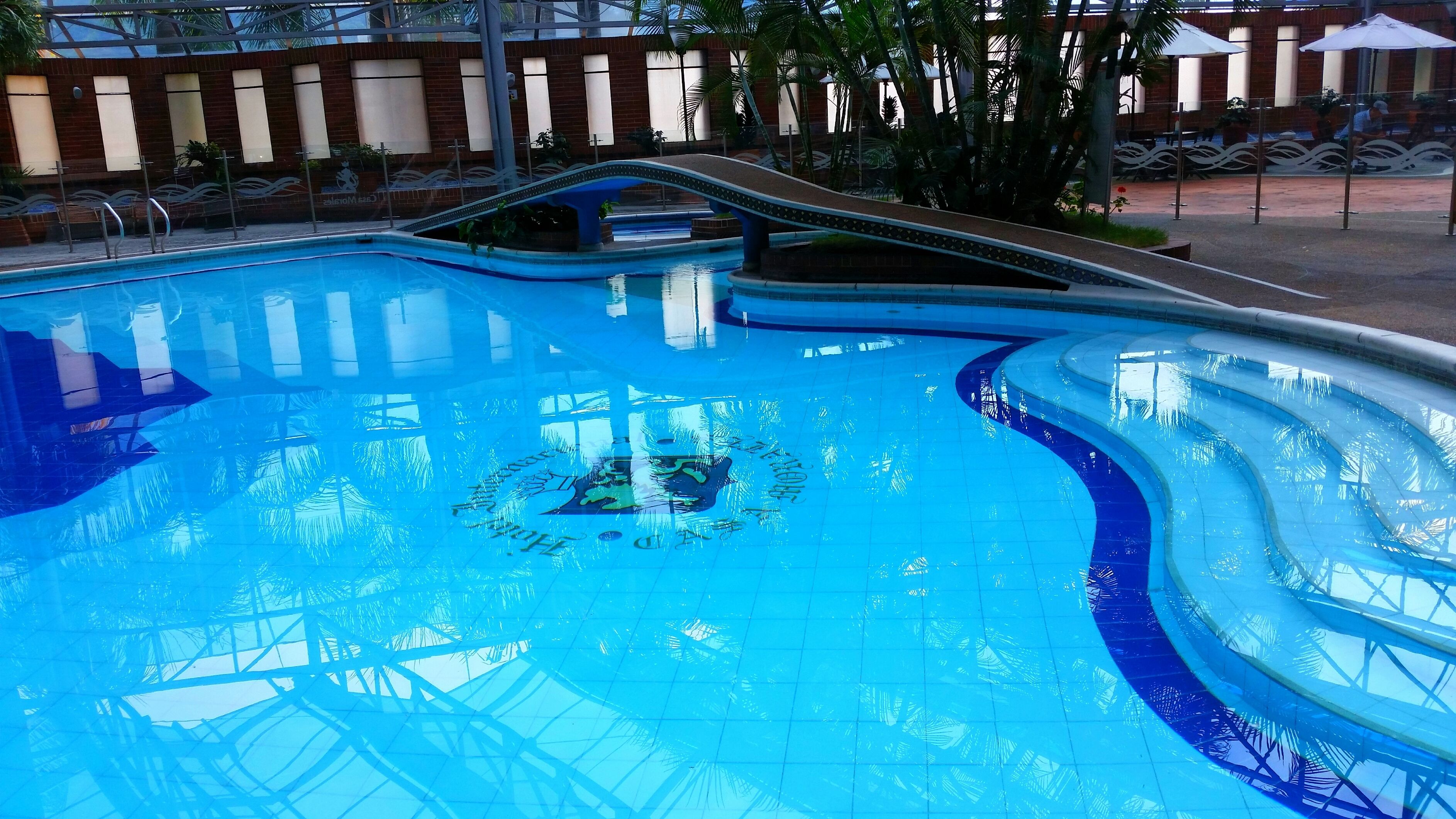 Indoor pool, open 9:00 AM to 9:00 PM, pool loungers