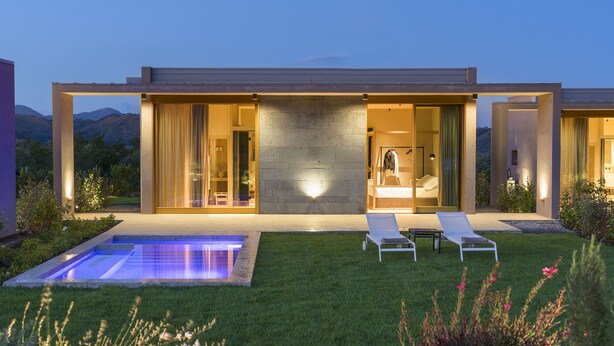 A modern house with a swimming pool, two lounge chairs, and a bathroom visible through the open doors. - Villa Neri Resort & Spa (Linguaglossa)