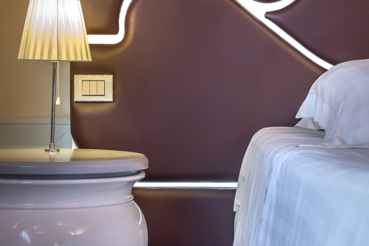 Premium bedding, down comforters, memory foam beds, minibar