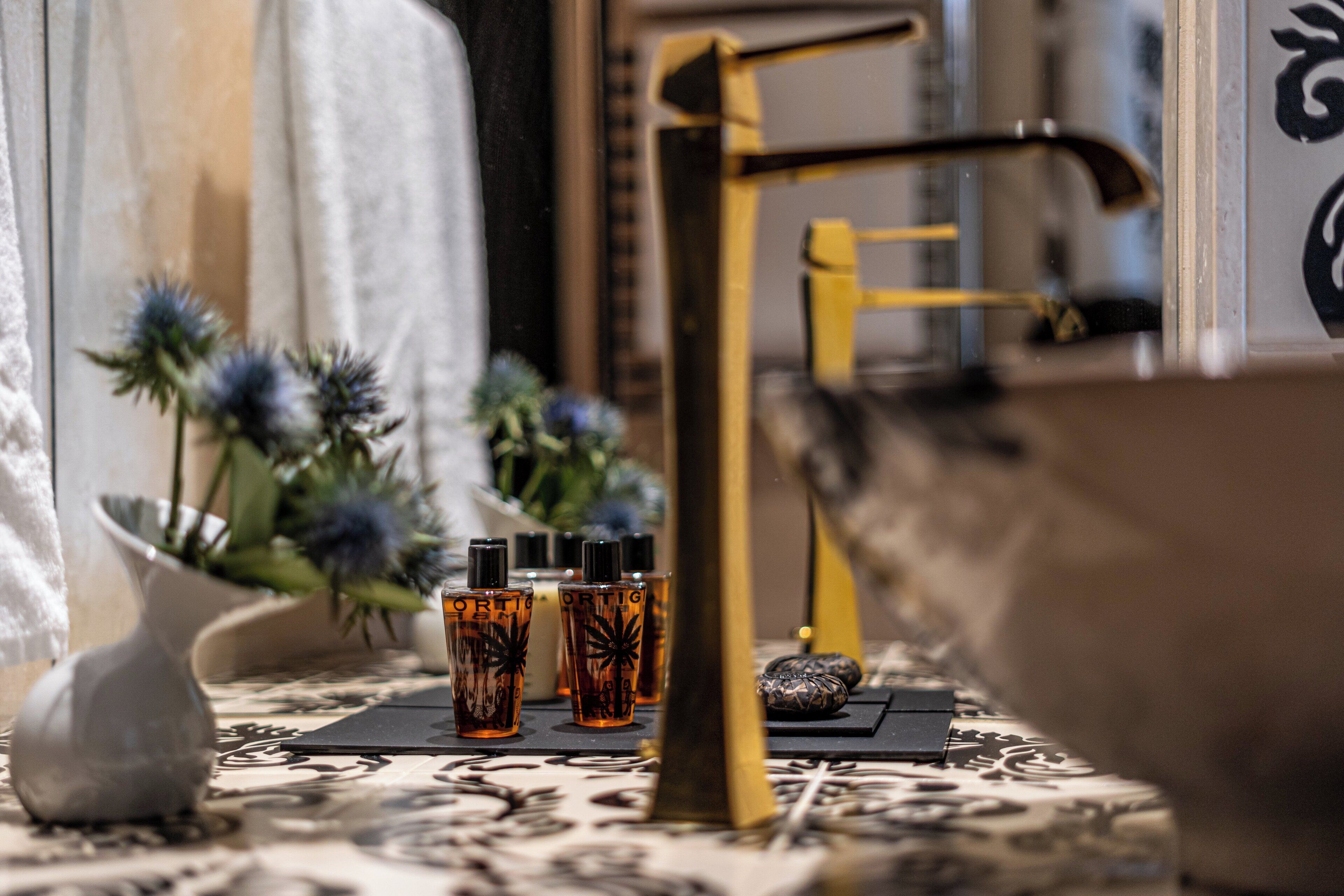 suite | bathroom | rainfall showerhead, designer toiletries, hair dryer, bathrobes