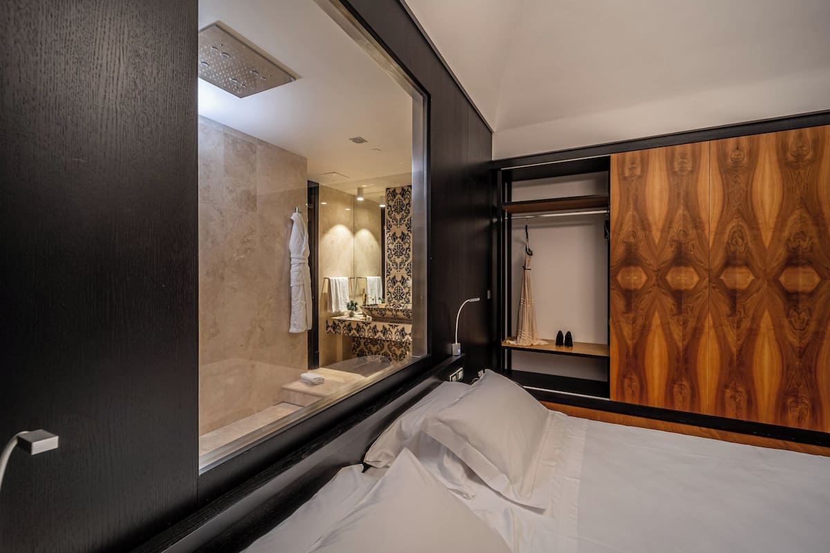 suite | premium bedding, down duvets, memory-foam beds, minibar