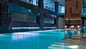 Indoor pool, outdoor pool, pool umbrellas, pool loungers
