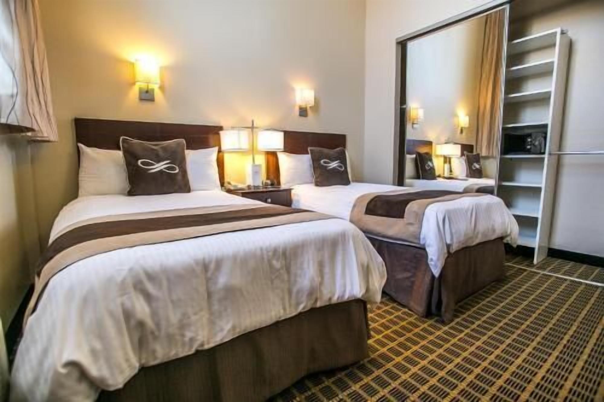 1 bedroom, premium bedding, down comforters, pillowtop beds