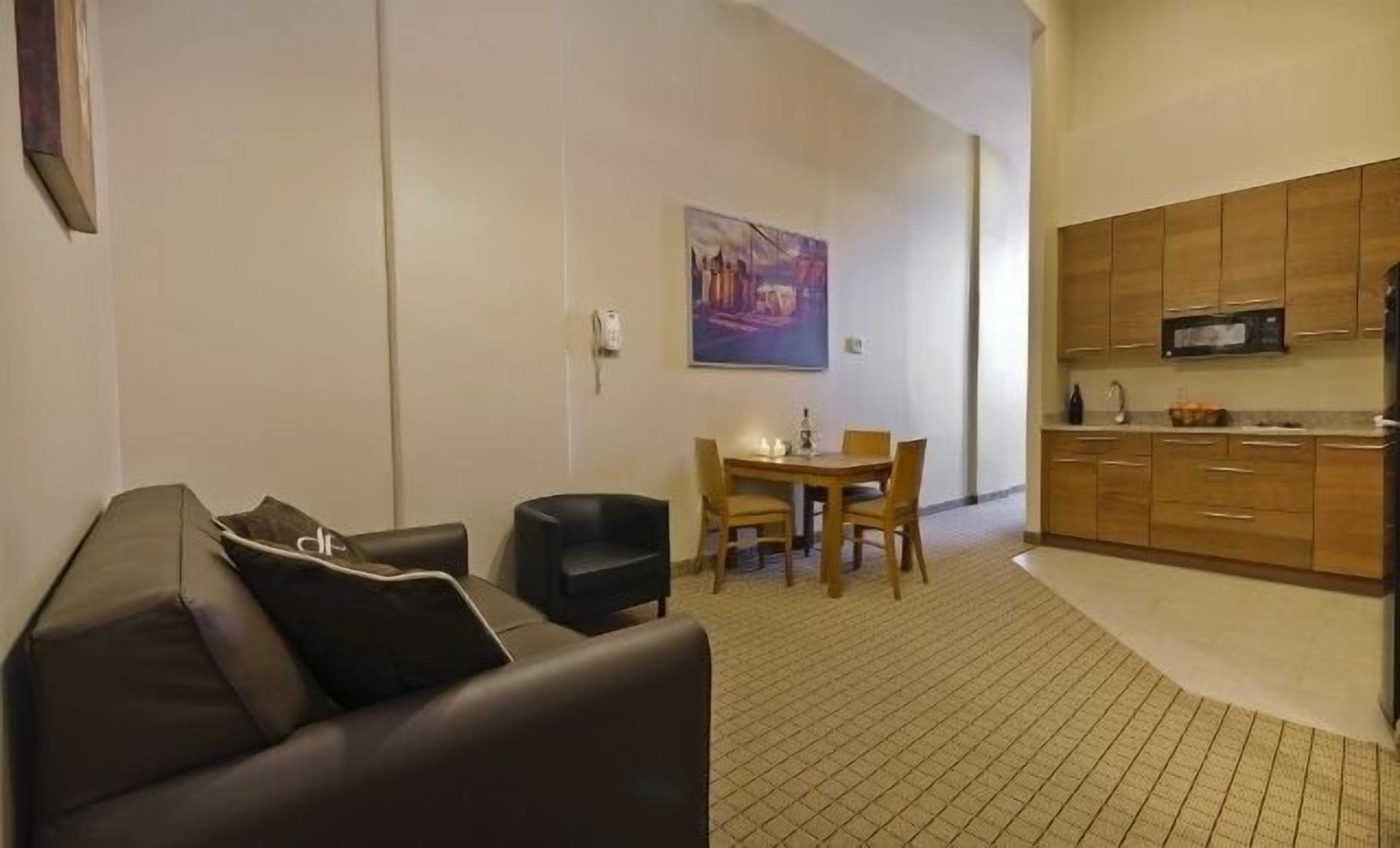 Suite, 2 Double Beds | Living area | Flat-screen TV