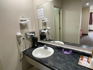 Room, 1 King Bed, Non Smoking | Bathroom | Combined shower/tub, rainfall showerhead, free toiletries, hair dryer