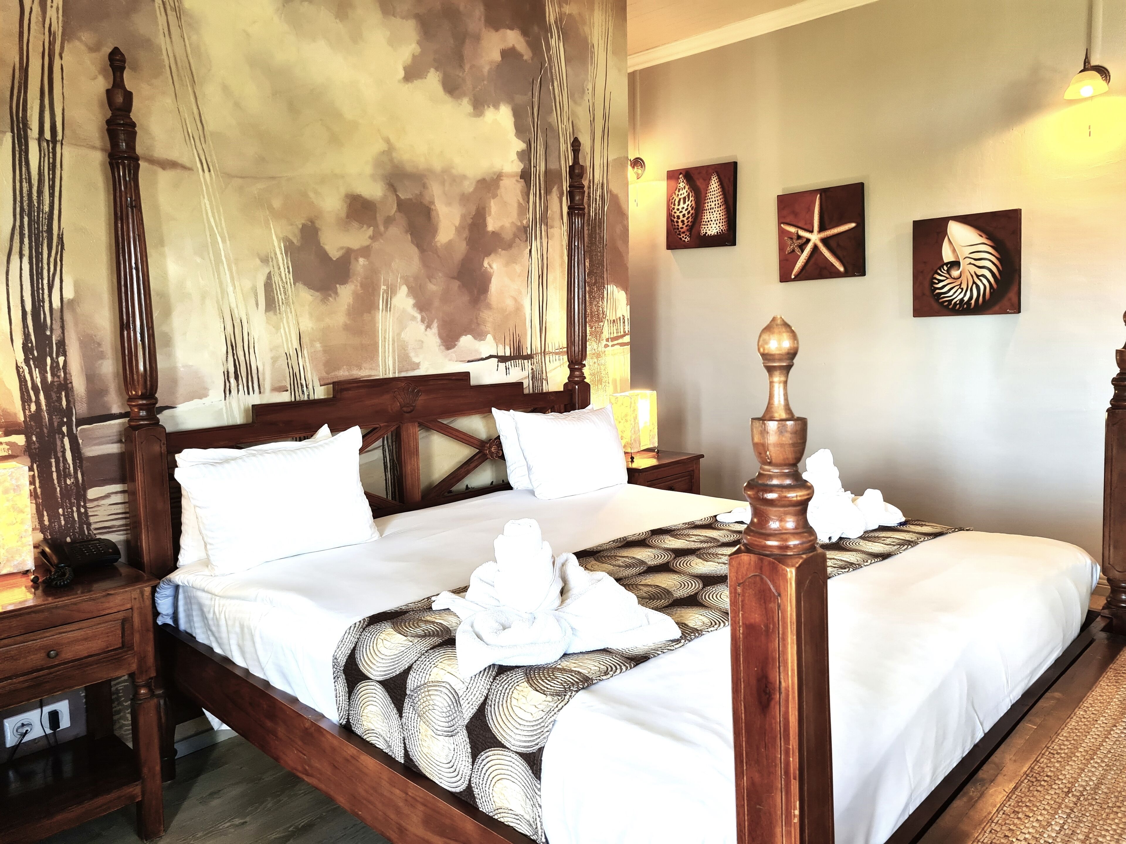 family room, 2 bedrooms | premium bedding, in-room safe, individually decorated