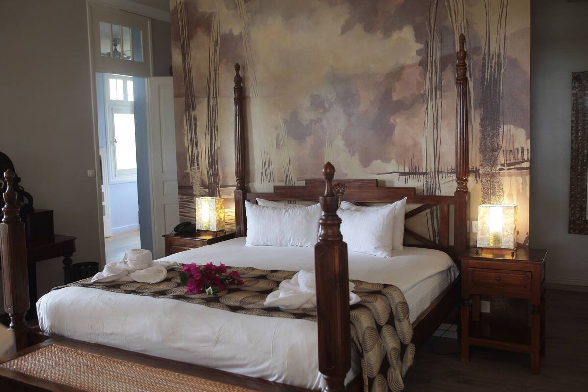 family room, 2 bedrooms | premium bedding, in-room safe, individually decorated