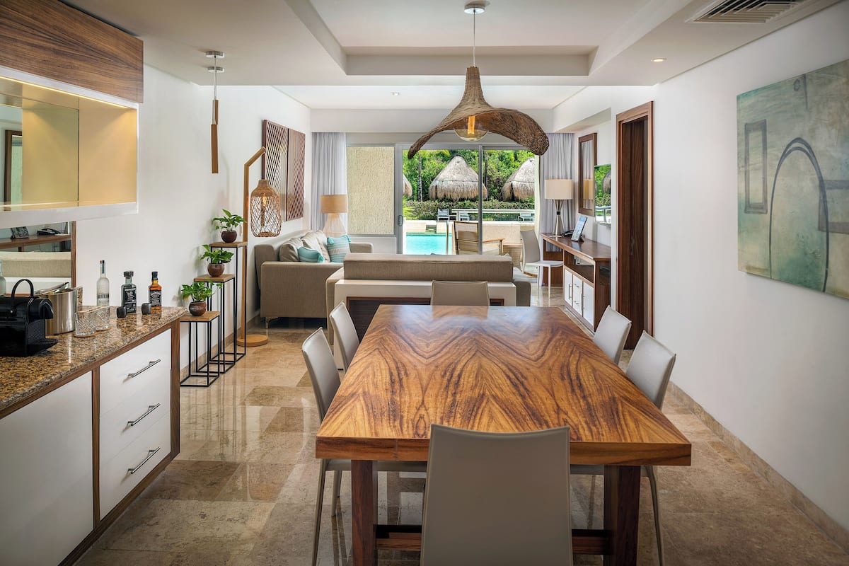 The Reserve Two Bedroom Master Swim Up | Living area | 50-inch flat-screen TV with cable channels, TV