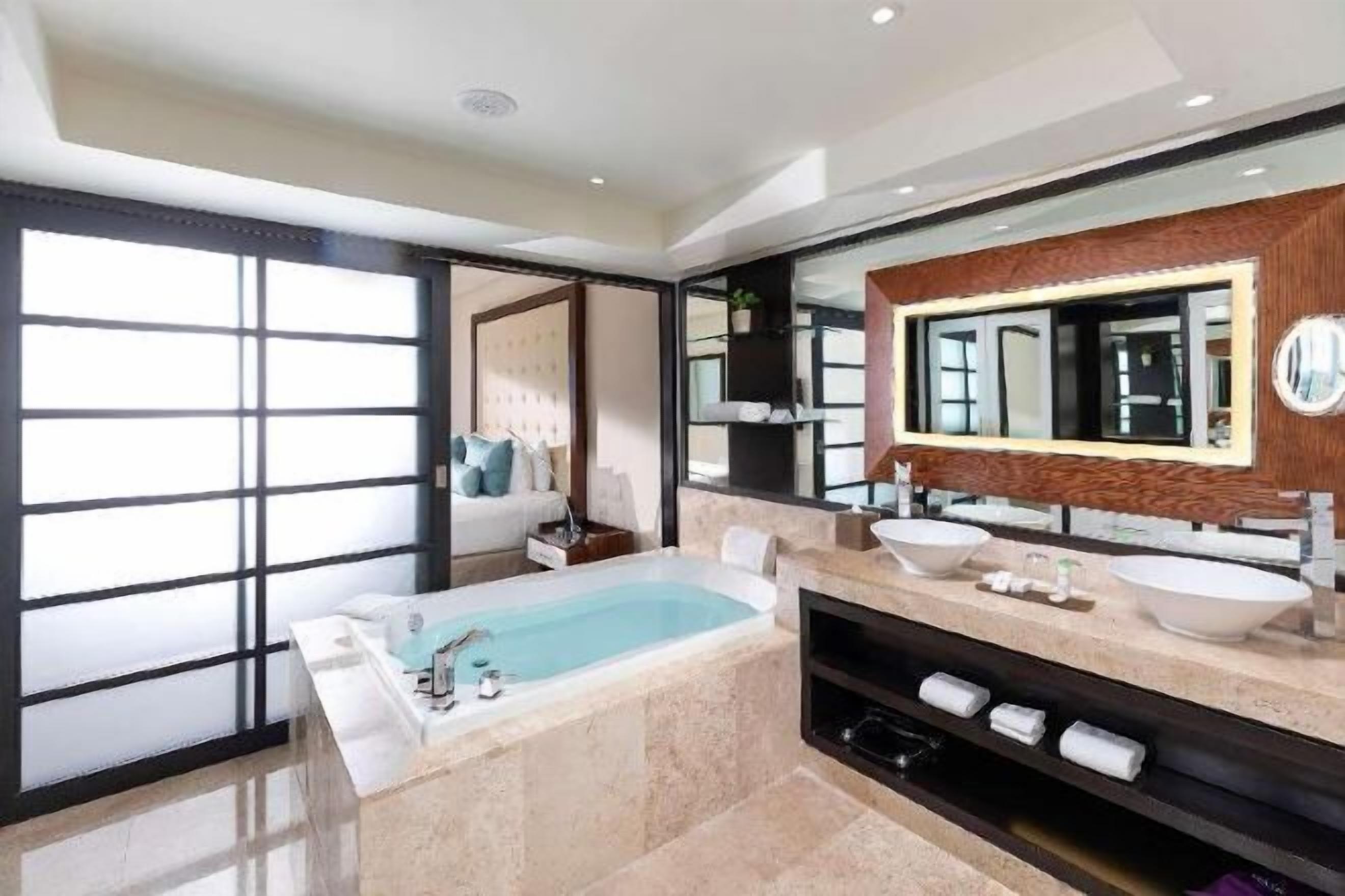 Shower, rainfall showerhead, designer toiletries, hair dryer